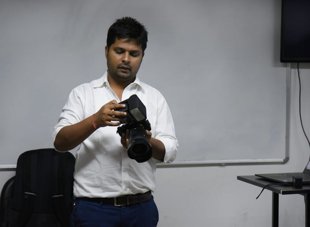 Photography students learning about new inventions
